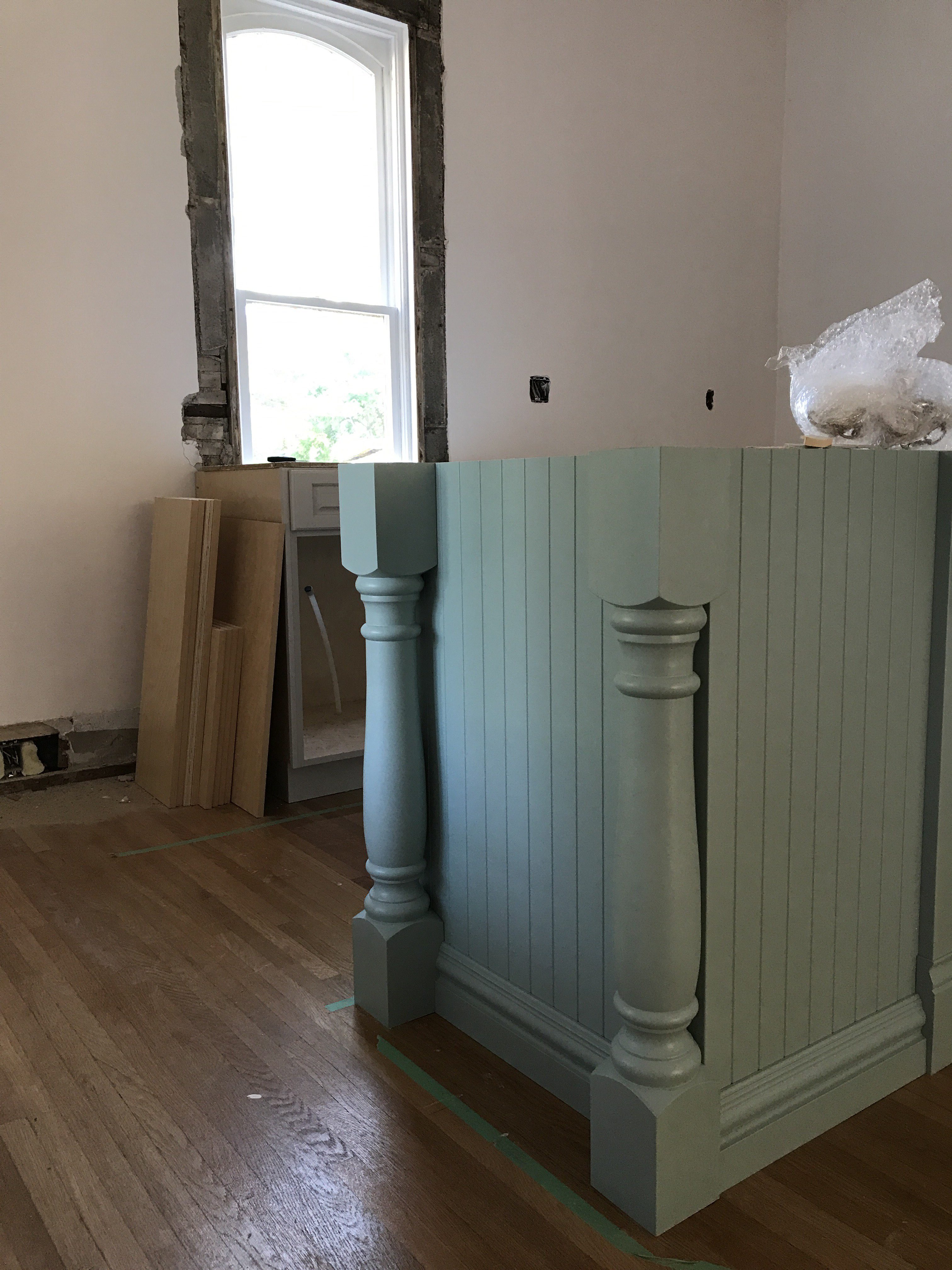 image of kitchen island turned posts and wythe blue colour