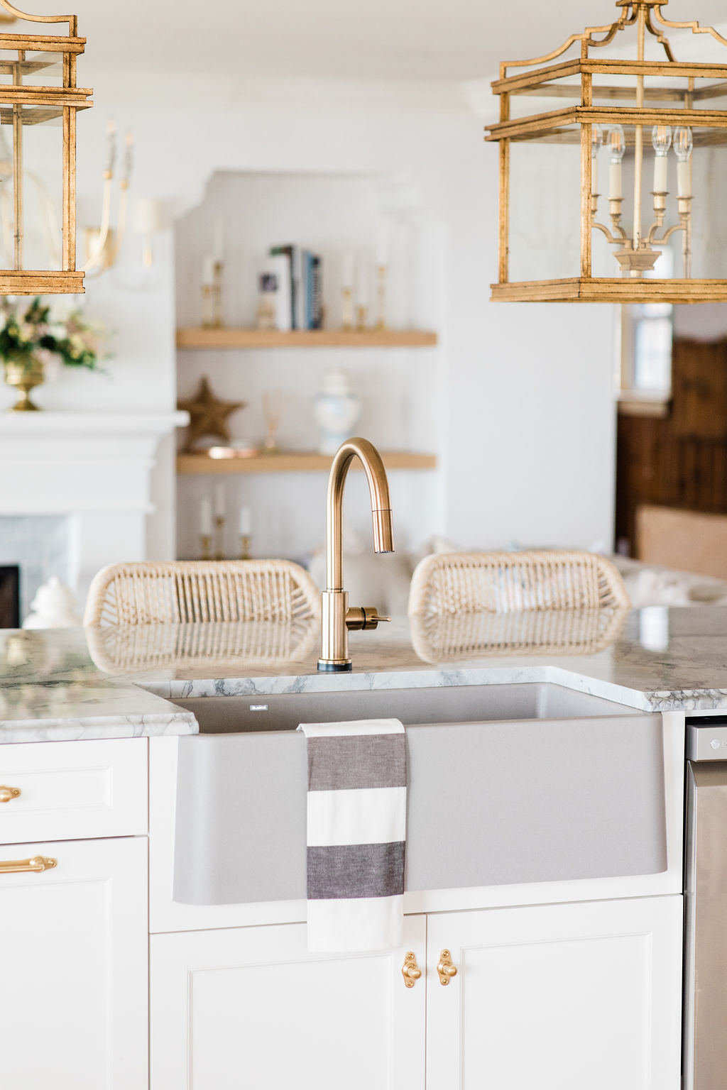blanco-silgranit-farmhouse-sink-delta-champagne-bronze-trinsic-faucet-coastal-kitchen  - The Leslie Style