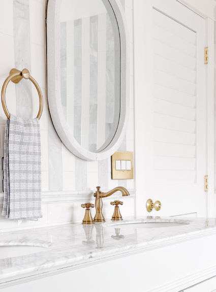 Marble Tile Stripes and Round Window Bathroom Reveal